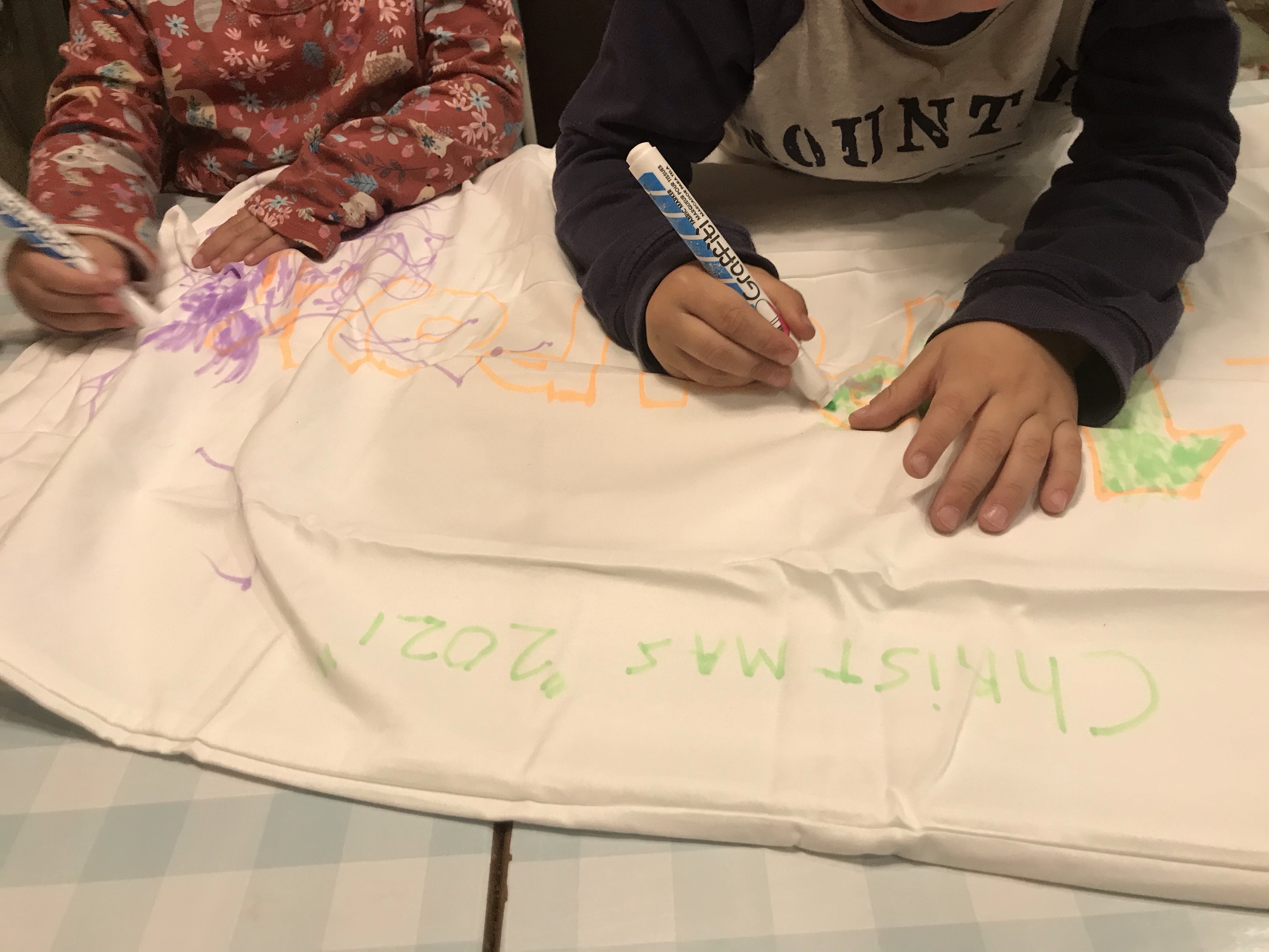 children making gift for grandparents